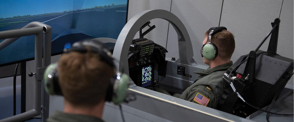 Student naval aviators operate a flight simulator for training in the T-6B Texan II. The ability to take ground school knowledge from the classroom to the cockpit is what separates future naval aviators from those who may not make it. 