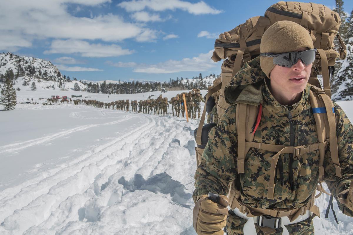 Marine prepares for a conditioning hike during a deployment for training exercise at Mountain Warfare Training Center, Bridgeport, CA