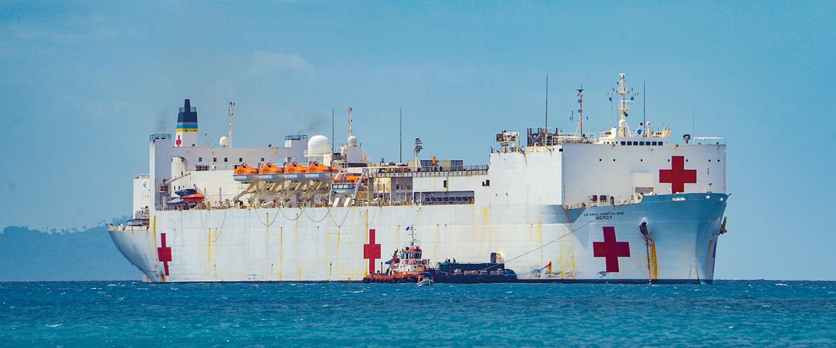 The hospital ship USNS Mercy (T-AH-19) anchored off Chuuk, Federated States of Micronesia, as part of Pacific Partnership 2024 in January. Several aspects of hospital ships must be improved to provide the full range of mass casualty care.
