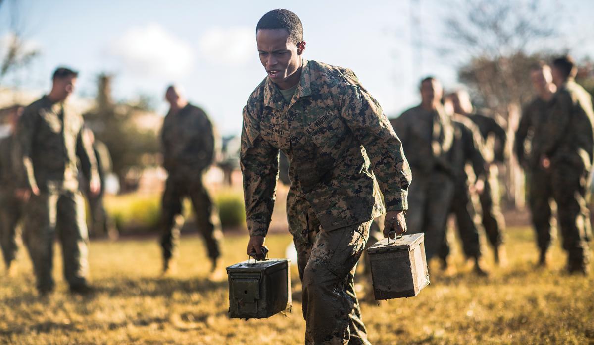 A Marine sprints with two ammo cans during the maneuver-under-fire portion of the combat fitness test, which complements the Marine Corps physical fitness test. A growing body of research shows a strong correlation between physical fitness and cognitive acuity. Exercise protects and creates new brain cells and activates the learning process, which is essential to outthinking and outsmarting adversaries.