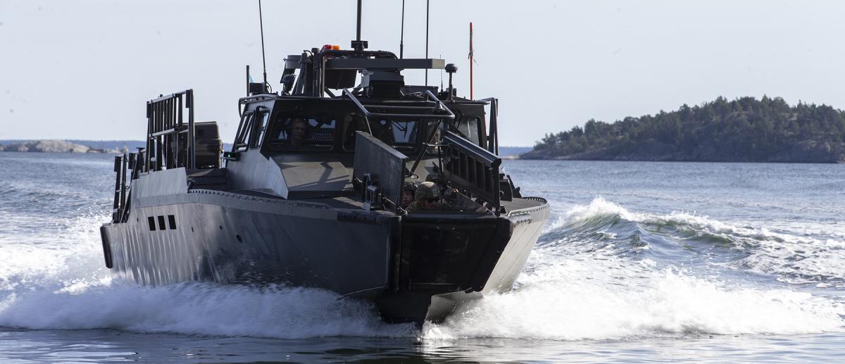 U.S. Marines approach a landing area in a CB-90 during Exercise Archipelago Endeavor with the Swedish Armed Forces in 2021. The Navy and Marine Corps should consider procuring and employing the Swedish Combat Boat 90 (CB-90) or similar craft for amphibious operations as an integral component of the Navy–Marine Corps amphibious team.