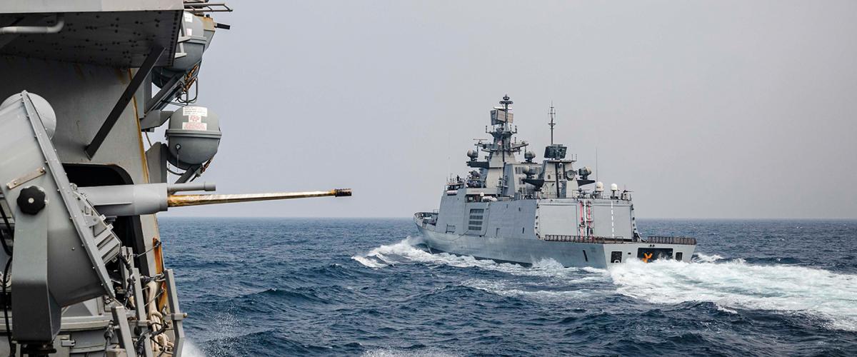 The Indian Navy multirole frigate Shivalik (right) sails with the USS John S. McCain (DDG-56) during Exercise Malabar 2020.