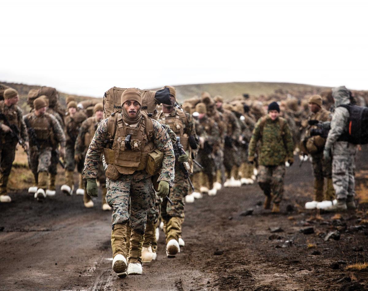 U.S. Marines with the 24th Marine Expeditionary Unit march across the Icelandic terrain in preparation for Exercise Trident Juncture 2018.