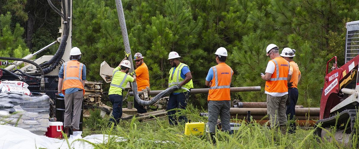 Navy contractors gather soil and groundwater samples for testing at Marine Corps Base Camp Lejeune, North Carolina. The Marine Corps instituted rigorous environmental tests after discovering the original water contamination, but the public is largely unaware of this.  