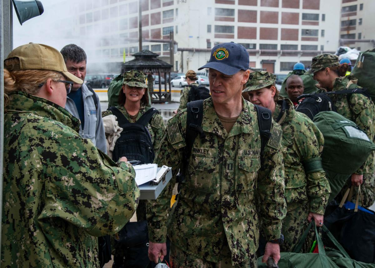 Navy reservists reporting to the hospital ship USNS Comfort ( T-AH-20) in Norfolk, Virginia, prior to its deployment to New York City last spring.