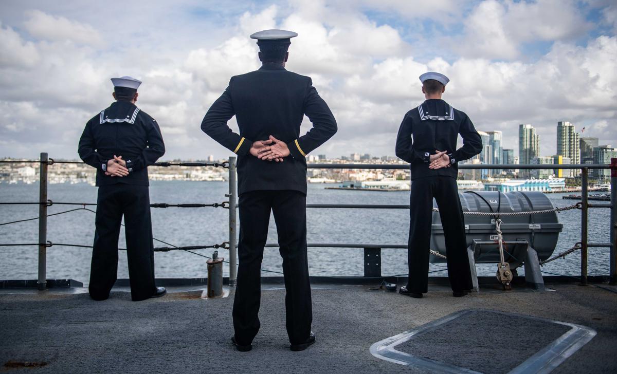 Sailors man the rails