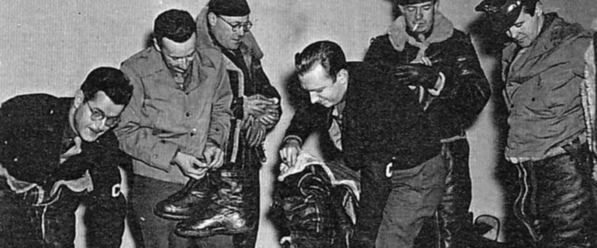 Future broadcast-news icon Walter Cronkite (center) and other American military journalists undergo flight training for bombing missions in 1943.