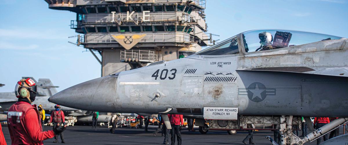 An F/A-18E Super Hornet attached to Strike Fighter Squadron 105 (note the drone silhouettes) on the flight deck of the USS Dwight D. Eisenhower (CVN-69) in the Red Sea. The Eisenhower Carrier Strike Group is conducting combat operations against Houthi rebels.