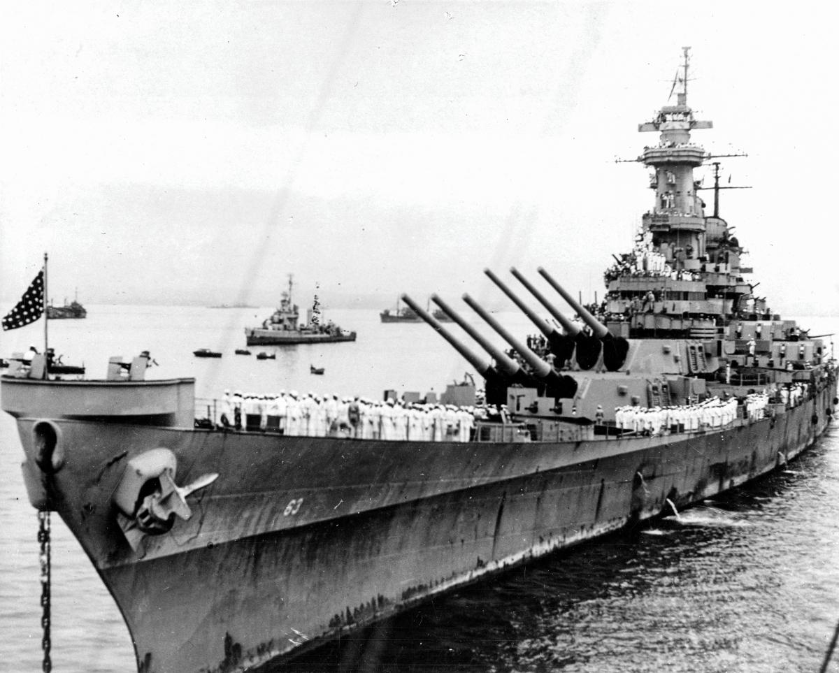 Port bow view of USS Missouri (BB-63) during the Japanese surrender ceremony in Tokyo Bay
