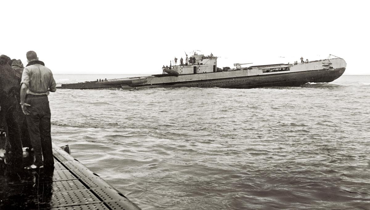 The Dutch submarine O-19 aground on Ladd Reef, a three-mile-long coral outcropping just inches below the surface in the South China Sea.
