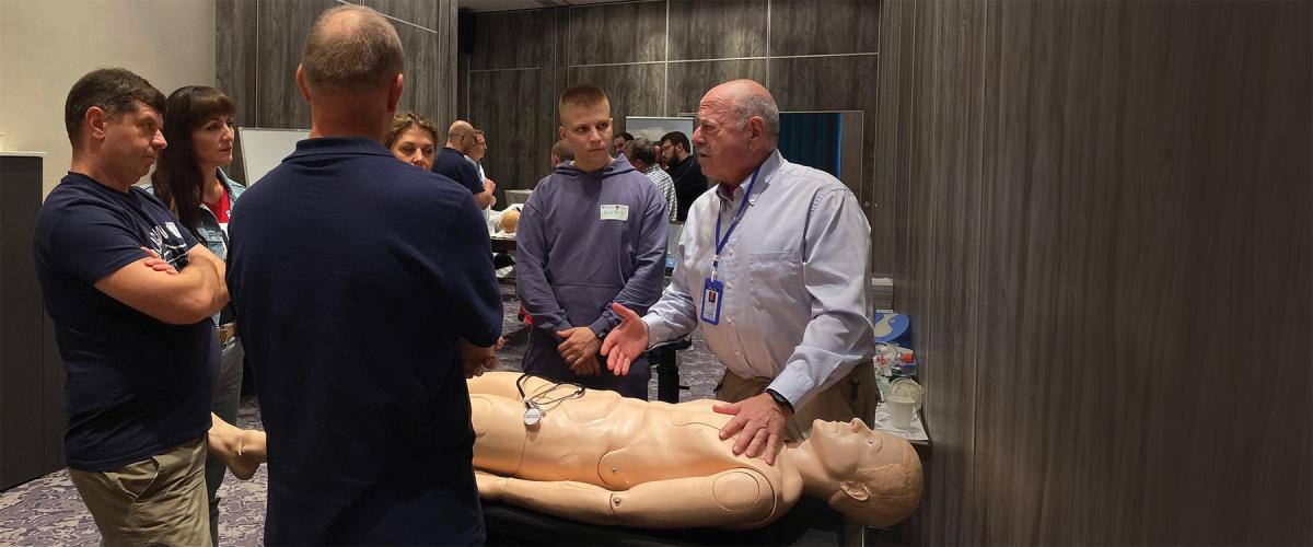 Admiral Baker in Ukraine teaching Advanced Trauma Life Support, a standardized  approach to  trauma patient care in the  “golden hour.”