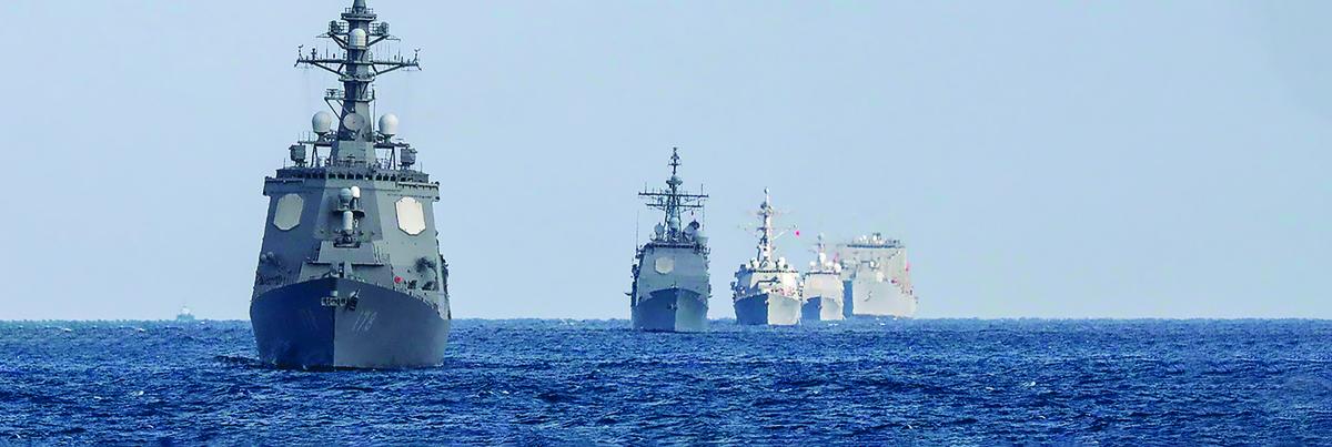 From left to right, the Japan Maritime Self-Defense Force guided-missile destroyer Ashigara, the USS Shiloh (CG-67), the Rafael Peralta (DDG-115), the Antietam (CG-54), and the USNS Washington Chambers (T-AKE 11) in formation in the Philippine Sea, in January 2023. 
