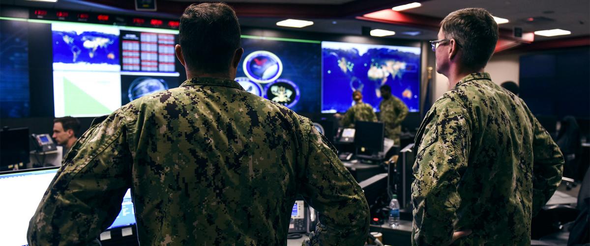 Sailors stand watch at the headquarters of U.S. Fleet Cyber Command