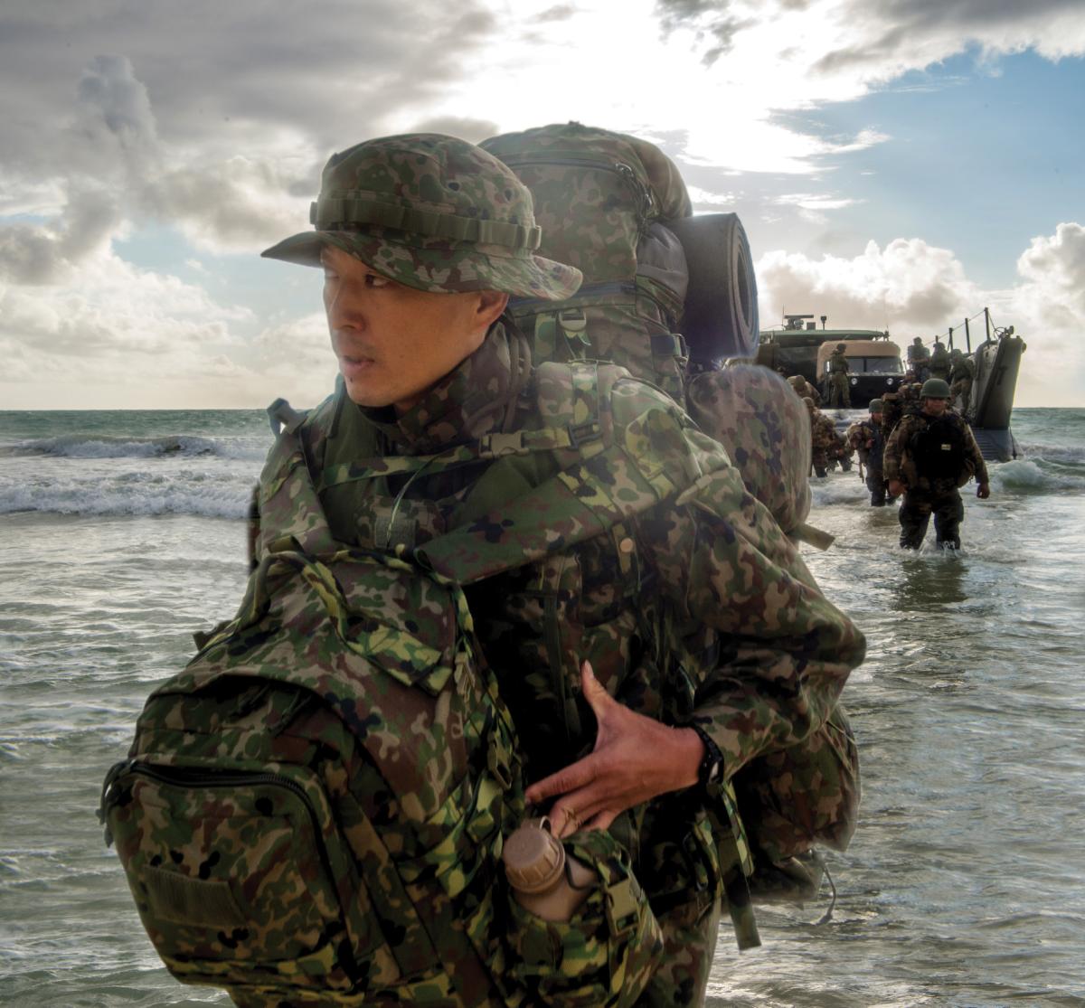 Service members from the Japan Ground Self-Defense Force, His Majesty's Armed Forces (Tonga) and U.S. Marines disembark an Australian army Landing Craft Mechanized (LCM-8) during a multinational amphibious assault raid during the Rim of the Pacific (RIMPAC) exercise, July 28, 2018.