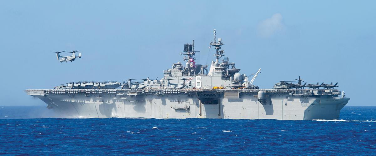 An MV-22B Osprey takes off from the amphibious assault ship USS America (LHA-6). Integrated U.S. naval power—modeled by Task Force 76/3 in the western Pacific—provides broader options for contingency and crisis response, as well as in conflict.