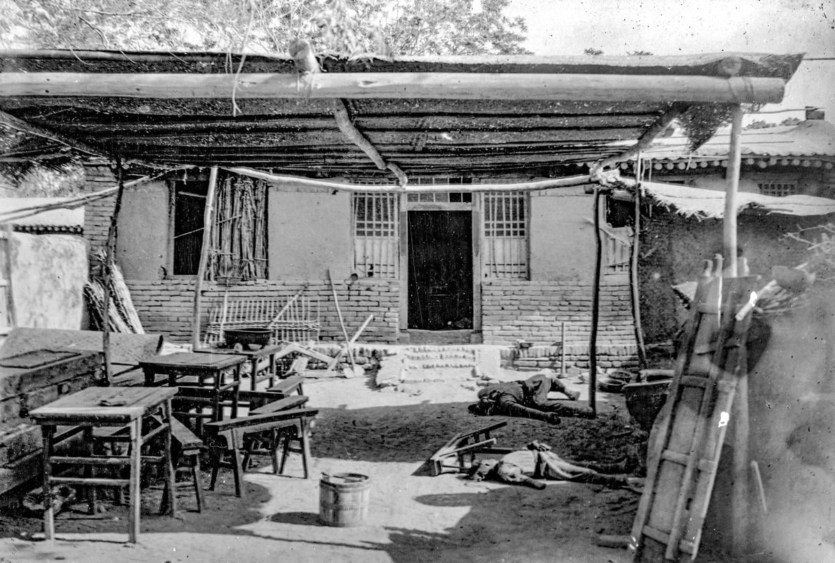Boxers killed in a village inn by British Marines.