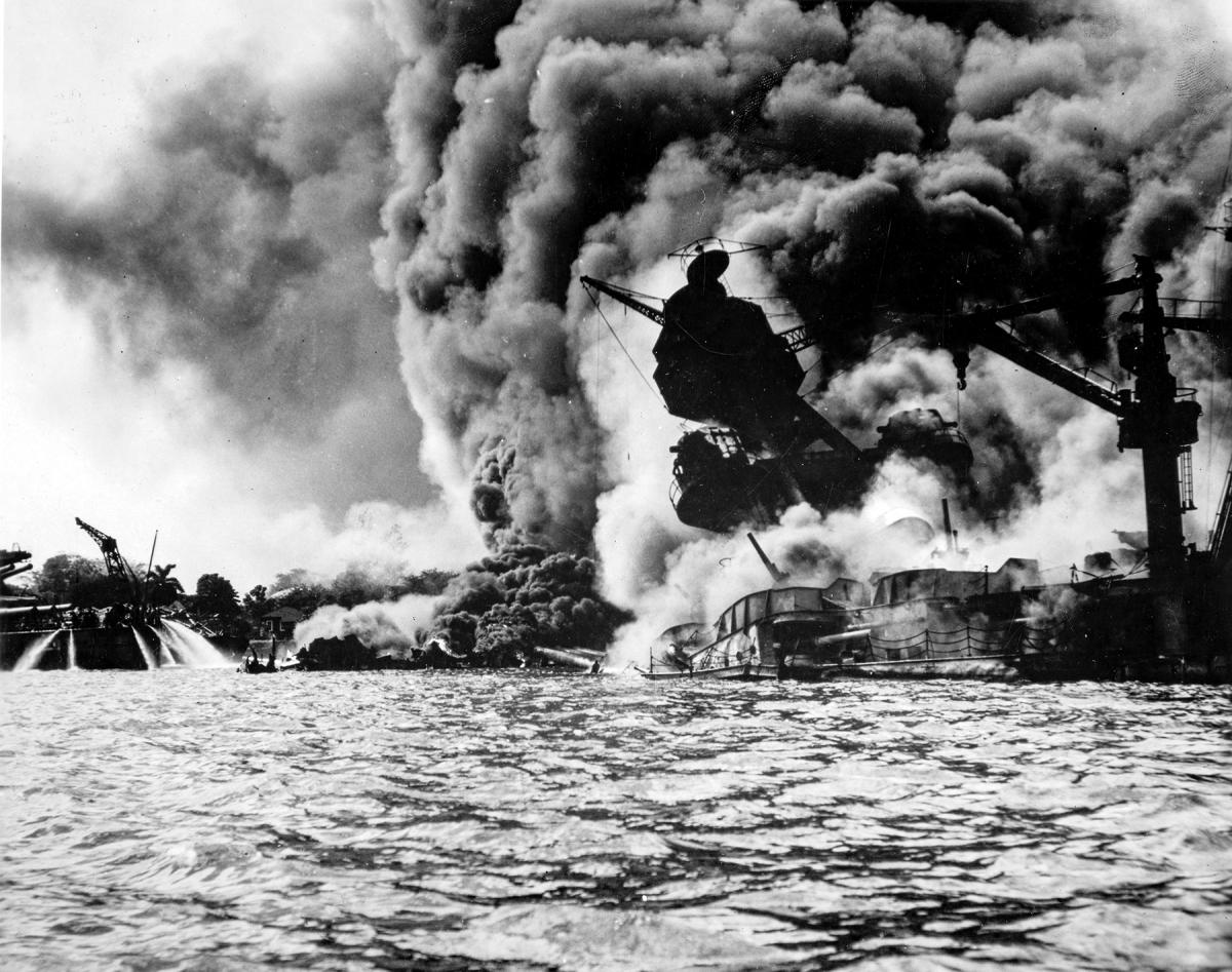 USS Arizon sunk and burning at Pearl Harbor