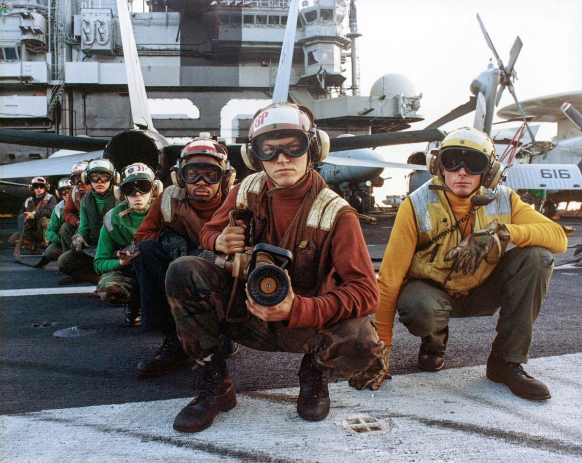 Deck firefighting team on board the aircraft carrier USS Saratoga (CV-60)