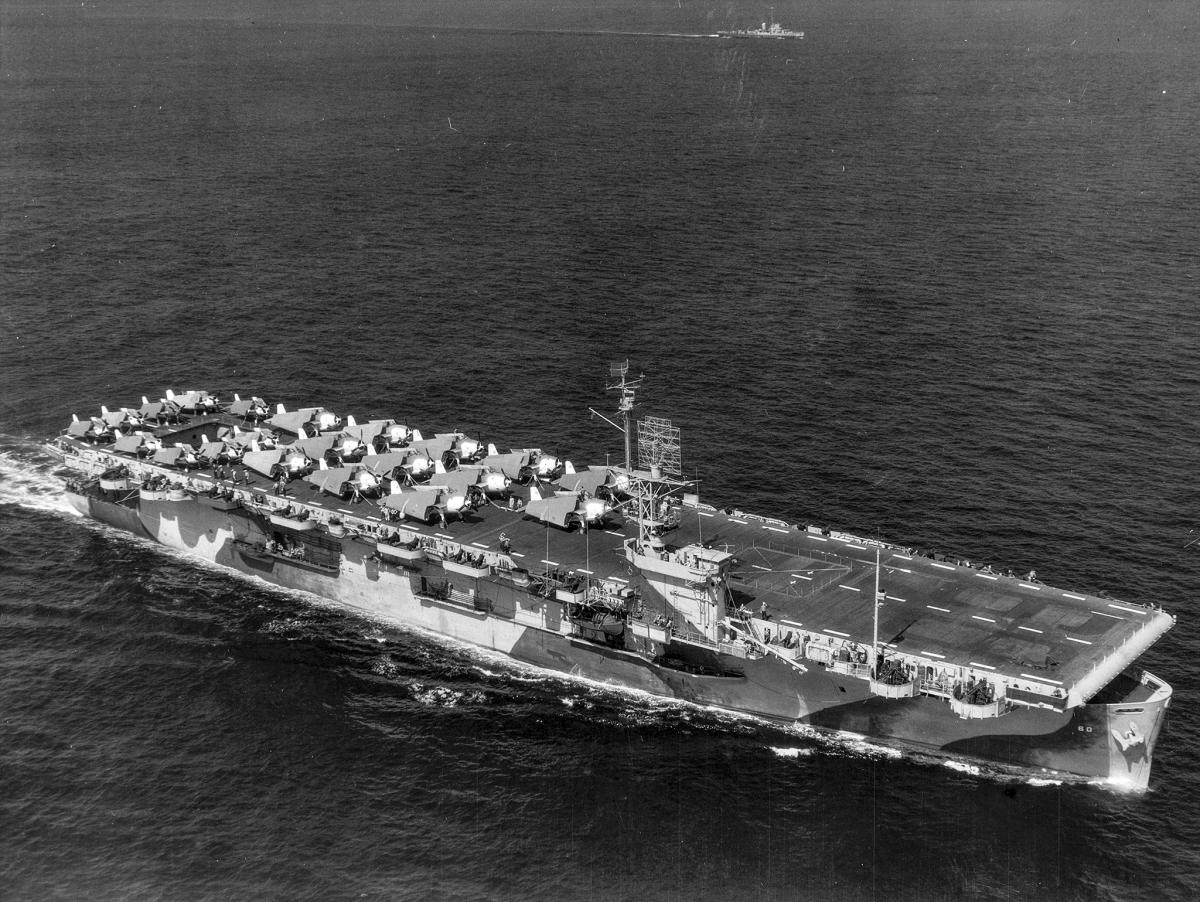 Aerial starboard bow view of the USS Guadalcanal (CVE-60) underway in the Atlantic Ocean