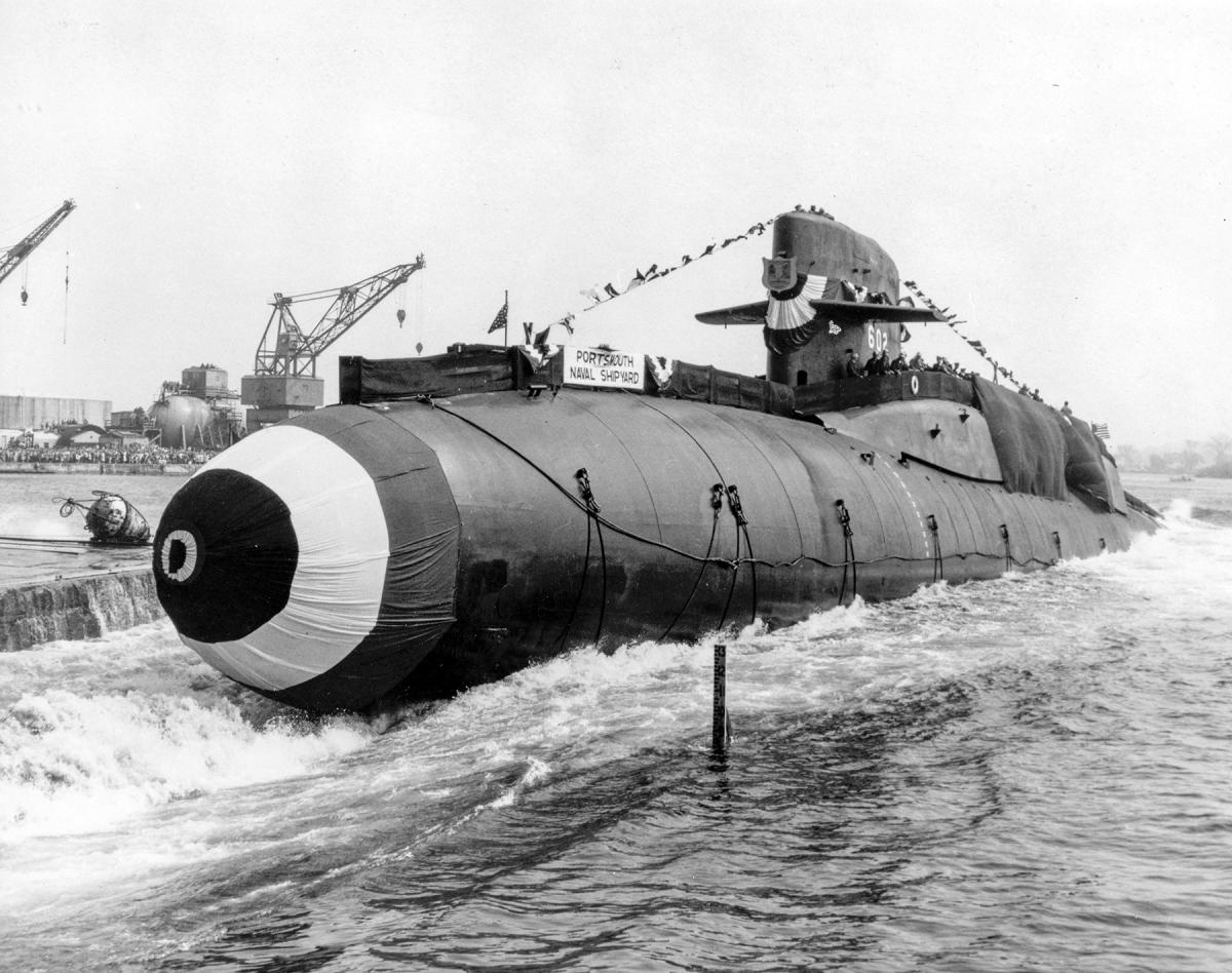 USS Abraham Lincoln (SSBN-602) slides down the ways during the launching ceremony in Portsmouth Naval Shipyar