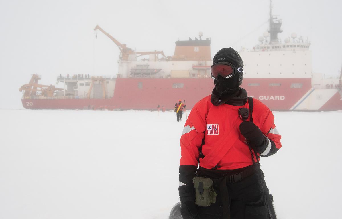  Petty Officer 1st Class Lisa Densmore stands polar bear guard outside the USCGC Healy (WAGB-20) on Sunday, Sept. 30, 2018 