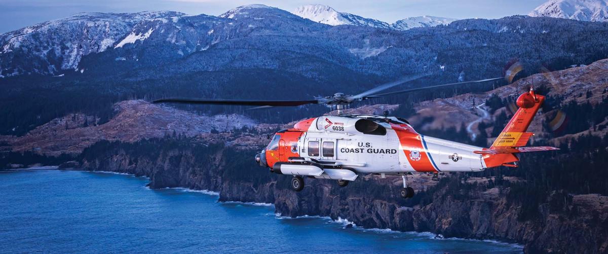 An Air Station Kodiak MH-60T Jayhawk flying near  Kodiak. In November, the Coast Guard accepted the first new-manufacture MH-60T hull from Sikorsky. The new hulls will extend the service life for the medium-range recovery helicopter fleet through the 2030s.