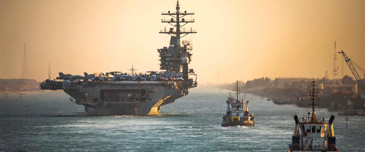The Nimitz-class aircraft carrier USS Dwight D. Eisenhower (CVN-69) transits the Suez Canal in November to the U.S. Fifth Fleet area of operations. 