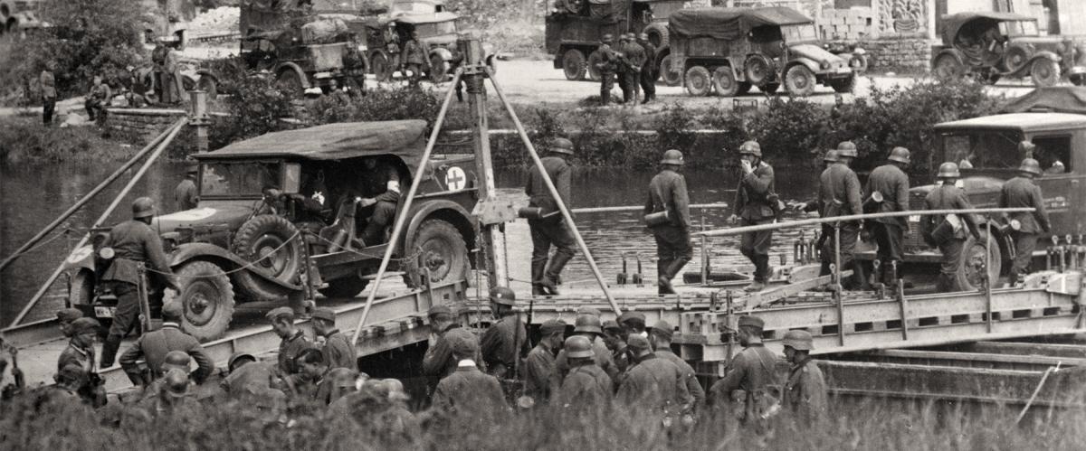German troops crossing the Meuse near Sedan,  Ardennes, in May 1940. The Germans’ rapid advance was aided by corps and division commanders’ independent actions. XIX Panzer Corps commander General Heinz Guderian recalled he “made all decisions independently until we reached the Atlantic at Abbeville.”