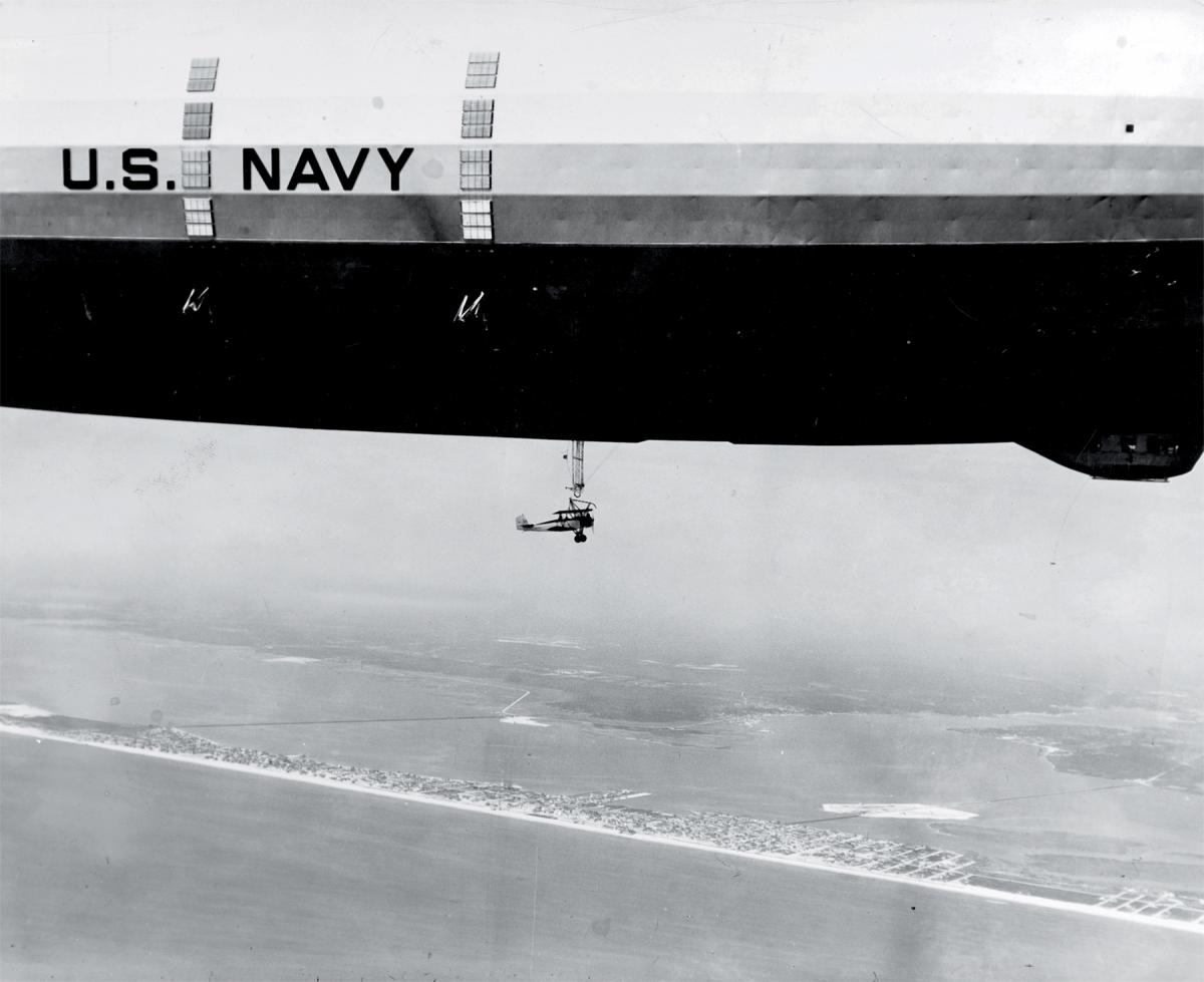 Waco N2Y-1 hooking on to the trapeze of USS Akron (ZRS-4)
