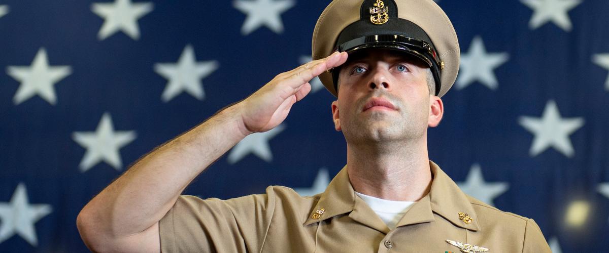 RED SEA (Sept. 13, 2019) Chief Aviation Electrician’s Mate Collin Peskett, assigned to amphibious assault ship USS Boxer (LHD 4), passes through the sideboys during the chief petty officer pinning ceremony in the hangar bay