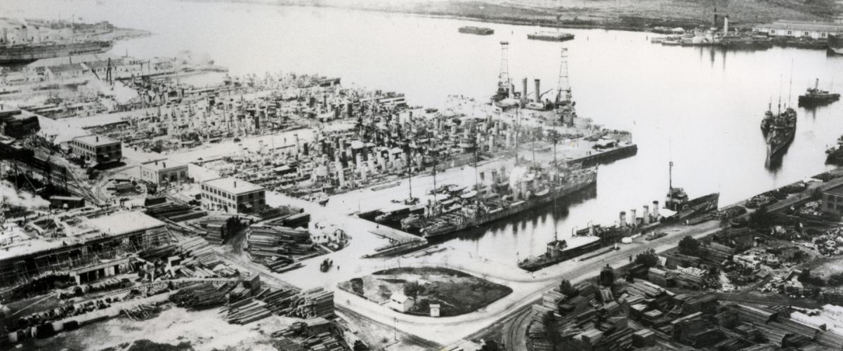The Reserve Basin, Philadelphia Navy Yard, filled in 1920 with World War I destroyers and several troopships, barely visible at the extreme left.