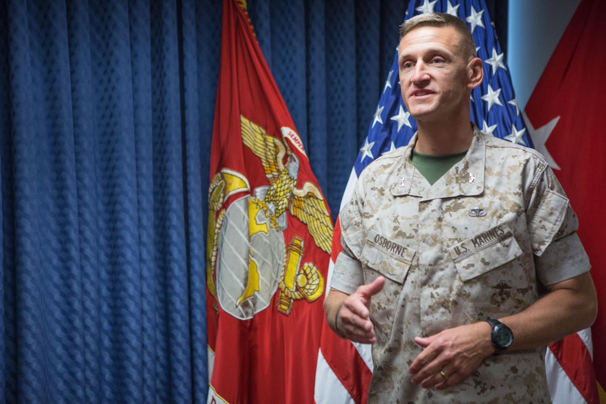 The assistant chief of staff (G-4) for Marine Corps Installations Command gives remarks at the Pentagon after his promotion.