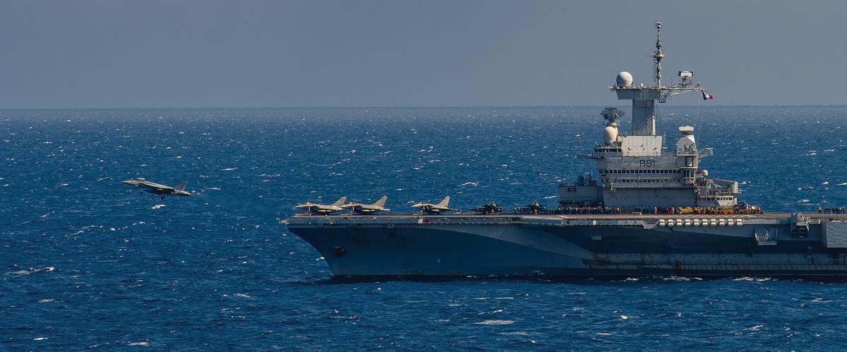 U.S. Navy F/A-18E launches from the French carrier Charles de Gaulle