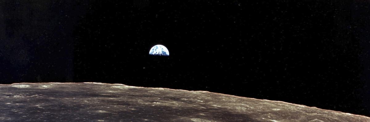 Earthrise over the moon as seen from Apollo 11
