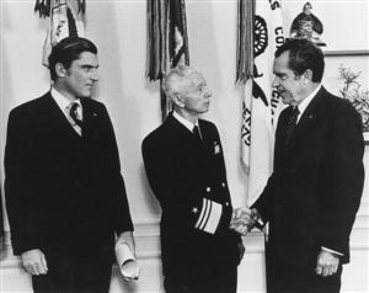 Admiral Hyman G. Rickover was one of the most influential officers in the post-World War II Navy and that influence is still felt today. Here Secretary of the Navy John Warner looks on as Rickover is congratulated by President Richard Nixon on his promoti