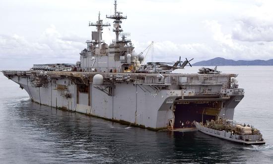 The USS Essex loads an LCU from her stern gate.