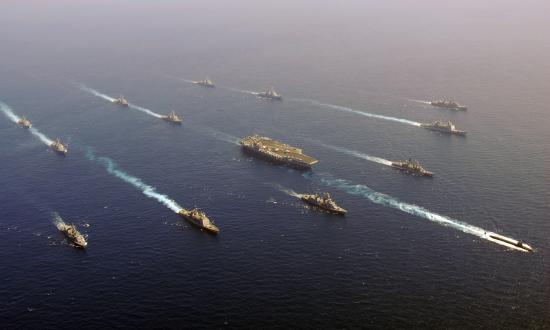 U.S. and Japanese ships transit in formation with the Nimitz-class aircraft carrier USS John C. Stennis (CVN 74), left, after a successful undersea warfare exercise involving the John C. Stennis Carrier Strike Group.