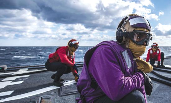 Sailors prepare for helicopter in-flight refueling