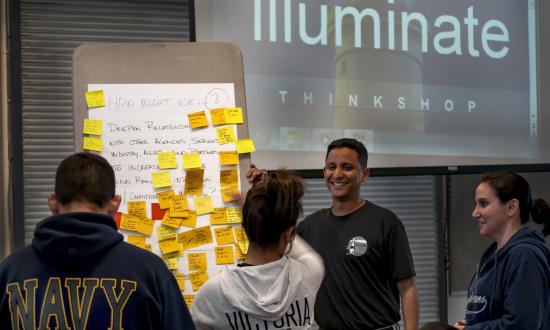Lt. Darryl Diptee, a program facilitator for Illuminate Thinkshops, leads a team-building activity. Illuminate Thinkshops provide participants with the inspiration, basic understanding, and tools to begin the iterative innovation process. 