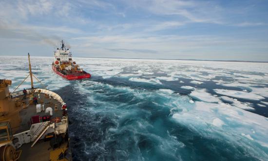 The U.S. Coast Guard Cutter Maple (WLB-207) follows the Canadian Coast Guard icebreaker Terry Fox through the waters of the Franklin Strait during a transit of the Northwest Passage 