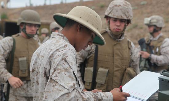 A rifle range instructor prepares to train Marines