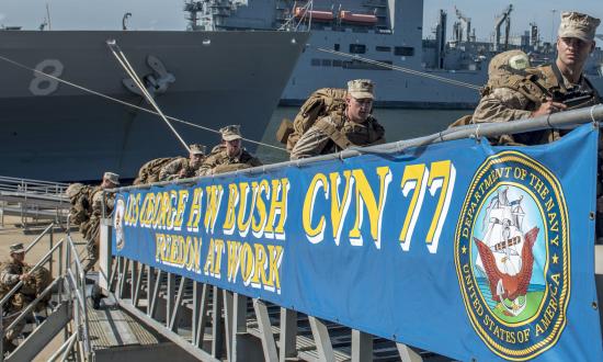 Marines board the USS George H. W. Bush (CVN-77) in Norfolk, Virginia, for ship-familiarization training.