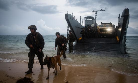 Marines with from the 31st Marine Expeditionary Unit debark a landing craft, utility, during a simulated humanitarian assistance and disaster relief exercise in Okinawa. 