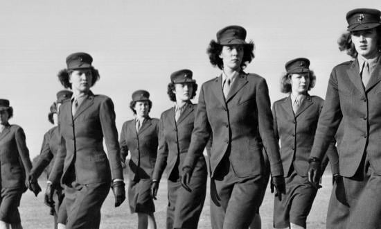 The Marine Corps Women’s Reserve of the 3d Marine Air Wing pass in review at Marine Corps Air Station Cherry Point, Havelock, North Carolina, November 1943.