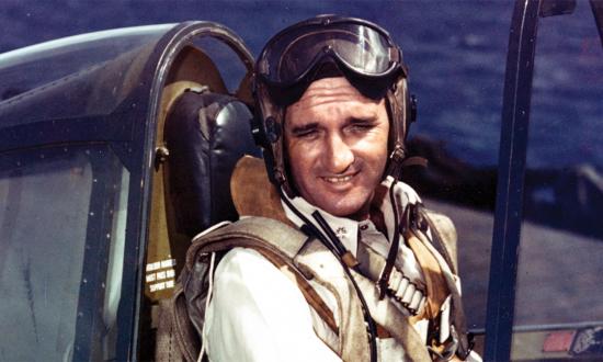 McCampbell poses in the cockpit of his Hellcat on board the USS Essex three days after the Battle of Leyte Gulf. Note the number of Japanese flags on the fuselage in comparison with the photo, taken just prior to the battle, on the cover of this issue. In the image at left, the ace’s total is now up to 30—reflecting his record-breaking nine kills in one day.
