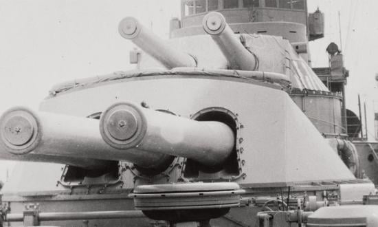 The USS Nevada’s pre-modernization triple-gun turret beneath her super-firing dual-gun turret.