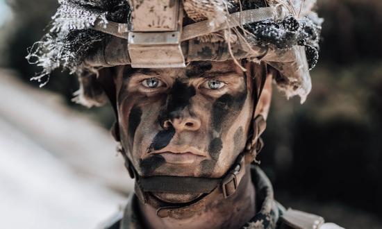 A Marine assigned to 3d Marine Division under the unit deployment program during live-fire maneuver drills on Camp Schwab, Okinawa, Japan.