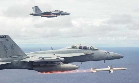 EA-18G Growlers from Electronic Attack Squadron (VAQ) 209 simultaneously fire two AGM-88  high-speed antiradiation missiles during a training exercise near Guam. The AGM-88 is the Navy’s sole antiradiation strike missile, and relatively short ranged considering the threat in the 2026 scenario.