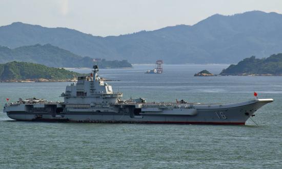 Chinese aircraft carrier Liaoning riding at anchor.