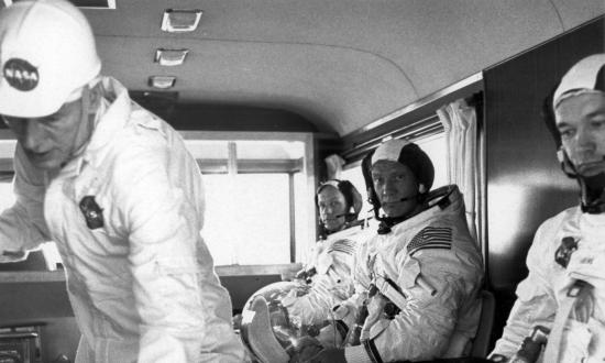 A NASA technician at left checks instruments inside a van to Kennedy Space Center Launch Complex 39A for a pre-flight test